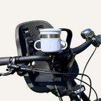 blue snack cup mounted onto a black bicycle