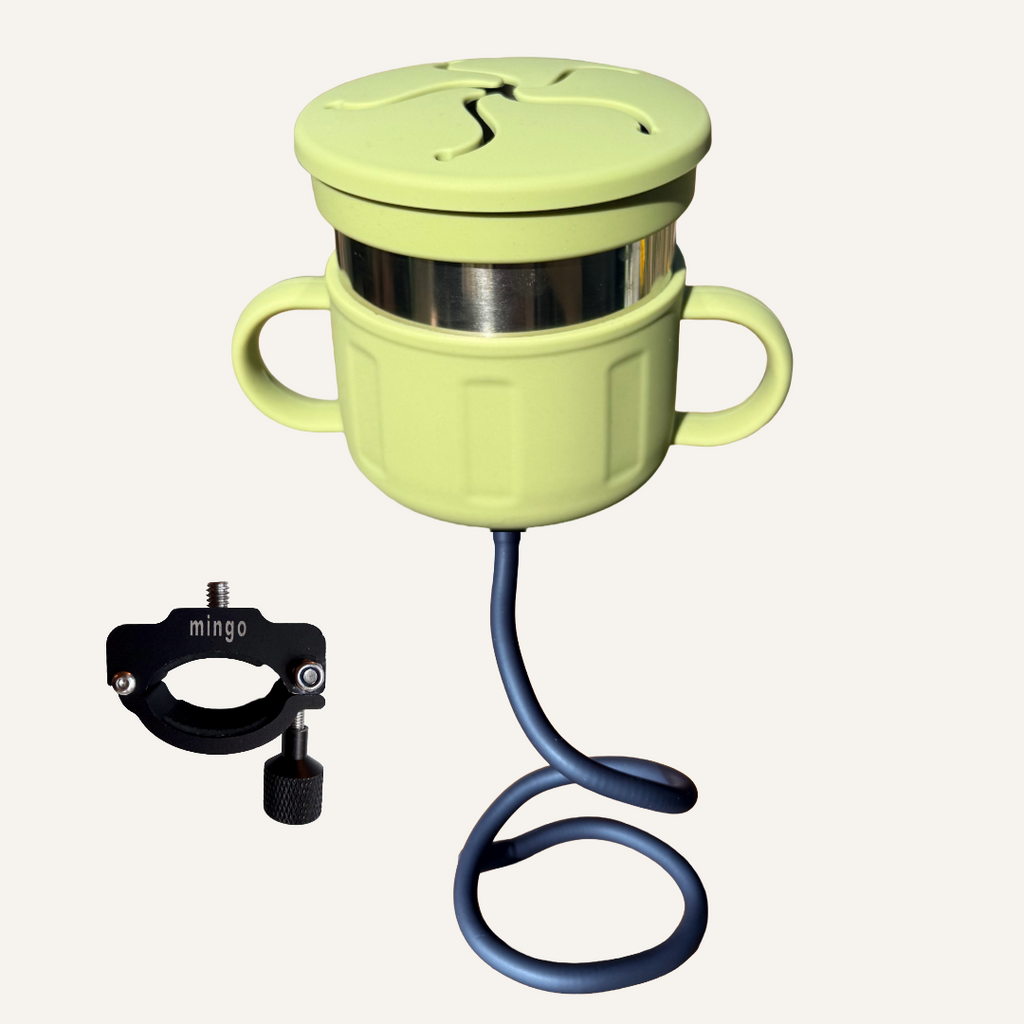 Green snack cup with a flex mount and bicycle mount on a white background